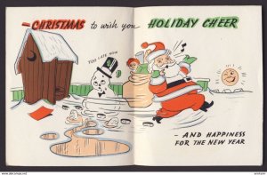 Novelty Christmas card. Shows a snowman needing to go but sign on outhouse door