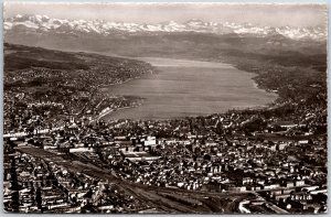 Zurich Switzerland Panorama Buildings Ocean Mountain Real Photo RPPC Postcard