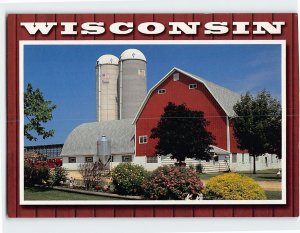 Postcard Wisconsin dairy farm at springtime, Wisconsin