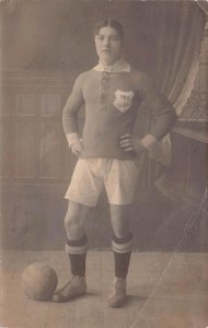 RPPC TEENAGE SCHOOL BOY SOCCER / RUGBY TKS EUROPE REAL PHOTO POSTCARD (1915)