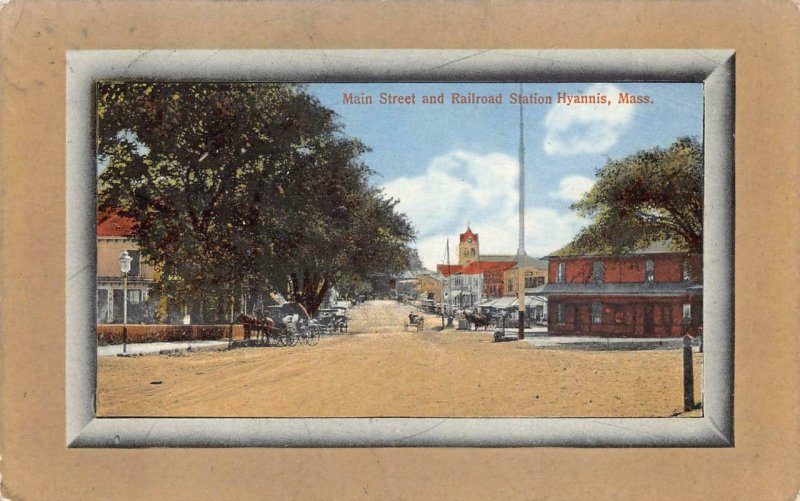 MAIN STREET AND RAILROAD STATION TRAIN DEPOT HYANNIS MASSACHUSETTS POSTCARD 1911