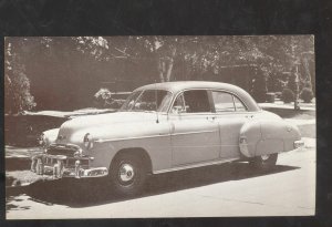 1949 CHEVROLET STYLELINE 4 DR VINTAGE CAR DEALER ADVERTISING POSTCARD CHEVY