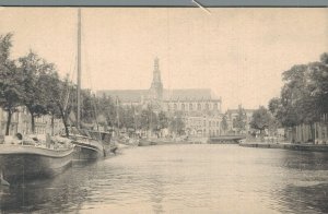 Netherlands Haarlem Spaarne met Grote Kerk Vintage Postcard 08.34