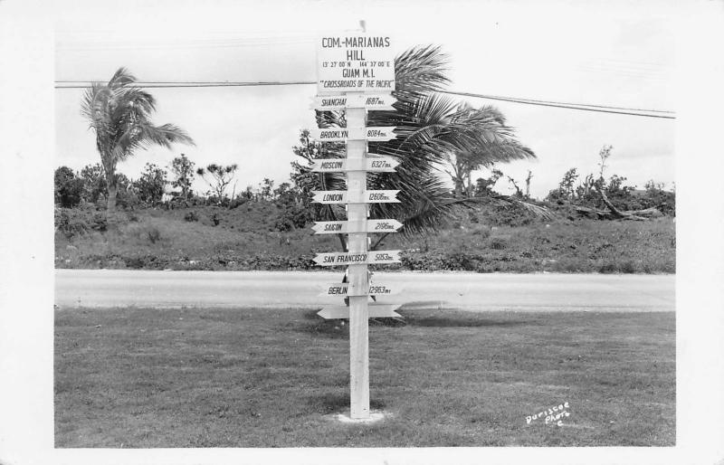 GUAM 1940s RPPC Real Photo Postcard Crossroads of the Pacific Signpost