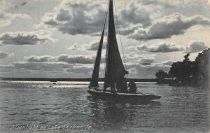 Okoboji Iowa Moonlight on Lake Sailing Vintage Postcard AA73262