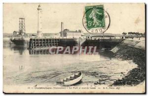 Ouistreham Old Postcard Harbor at low tide (lighthouse beacon)