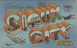 Greetings from Sioux City Iowa large letters airplanes c1940s linen D52 