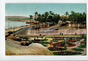 3098875 EGYPT Assuan The Gardens and Railway Station Vintage PC