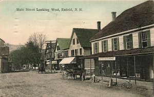 Enfield NH Main Street Looking West  Storefronts Horse & Wagons Postcard