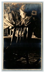 Vintage 1910's RPPC Postcard Photo of Woman Sitting in Chair Reading a Book