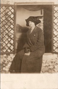 RPPC Lovely Woman Large Feather Hat Long Coat Studio Window Prop Postcard X3