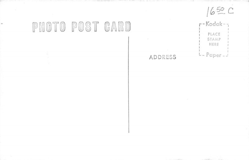 J51/ Phillipsburg Kansas RPPC Postcard c1950 Business District Stores 129