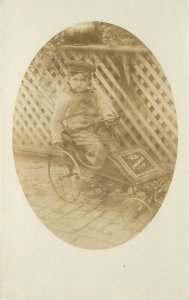 RPPC Postcard Little Boy in Pullman Pedal Car Oval Vignette