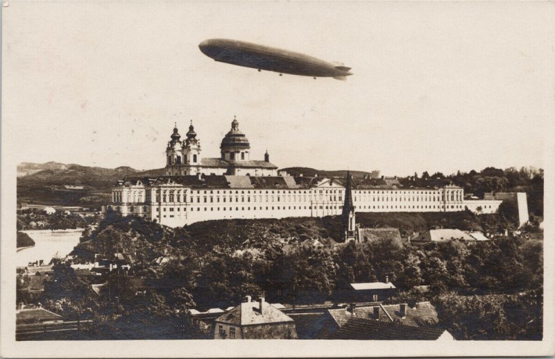 Zeppelin over Melk Austria c1920's w/ Osterreich Stamp Postcard E81