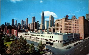 Postcard NY Mid-Manhattan skyline showing East Side Airlines Terminal