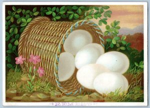 1880's LARGE TRADE CARD*REMERS*EMBOSSED VICTORIAN EASTER BASKET w/EGGS & FLOWERS