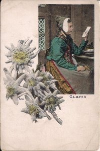 Edelweiss Flower, Woman in Window Holding a Mirror, pre-1907 Czech? Folk Costume