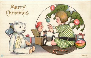 Embossed Postcard S/A M.E.P.  Girl Opens Christmas Presents Teddy Bear 613F