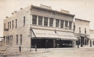 J32/ Olathe Colorado RPPC Postcard c1910 Bank Mercantile Store 40