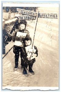 1941 Christmas Season's Greetings The Sabo's Sign Winter RPPC Photo Postcard