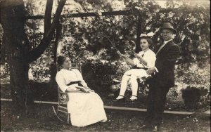 Father Pushes Daughter on Swing Mother Watches +++Amateur Photography RPPC