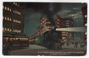 Syracuse, N.Y., N. Y. C. Train Going Through The Streets of Syracuse at Night