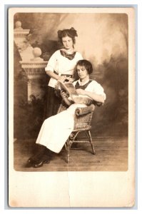 RPPC Studio View Two Women Wicker Chair Reading Book UNP Postcard H18