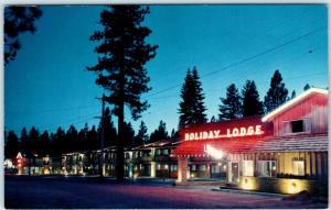 STATELINE, LAKE TAHOE California CA-NV Roadside HOLIDAY LODGE Night  Postcard