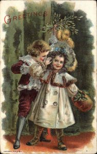 Boy Traps Little Girl Under Mistletoe Vintage Clothing c1910 Vintage Postcard