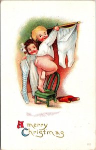 Merry Christmas, Children Hang Pajamas, Not Stockings Embossed Postcard T67