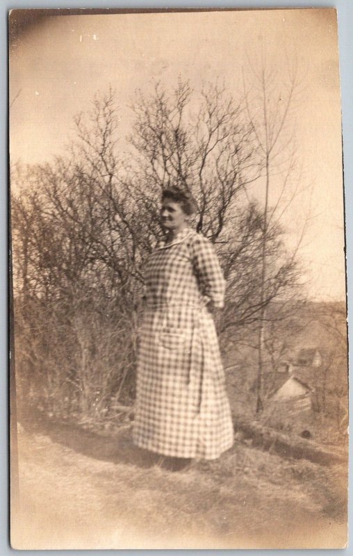 1920s RPPC Real Photo Postcard Woman Standing Outside In Plaid Dress