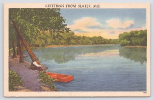 Slater Missouri~Man Fishing from Shore on River~1958 Postcard