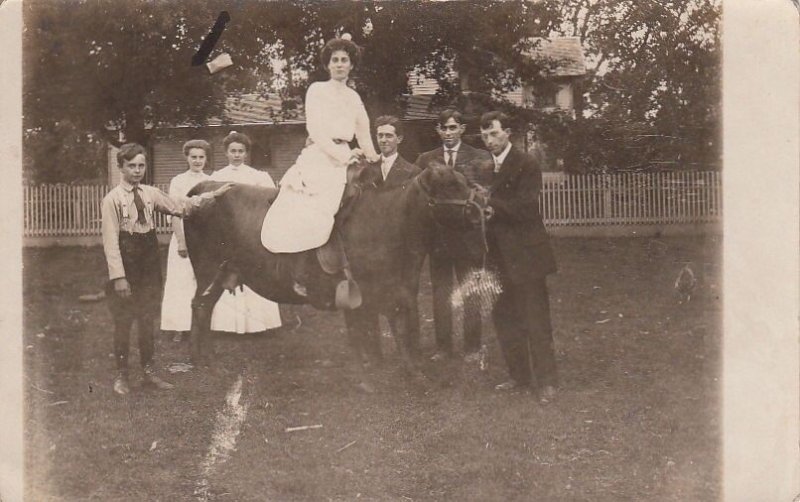 RPPC Postcard Woman Riding a Cow