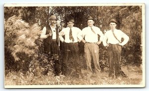 c1910 INTERESTING PHOTO 4 WELL DRESSED MEN HATS TIES VELOX RPPC POSTCARD P2769