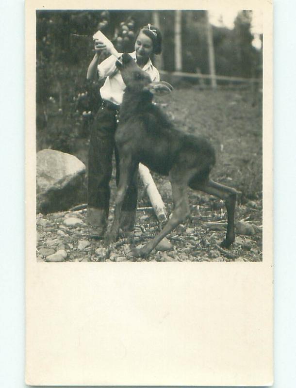 1930's rppc WOMAN FEEDS BABY DEER Postmarked Wapiti - Near Cody Wyoming WY i7111