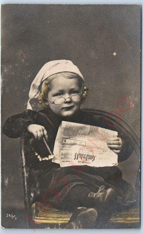 c1910s Germany Handsome Little Boy Reading & Smoking Cigar RPPC Real Photo A141