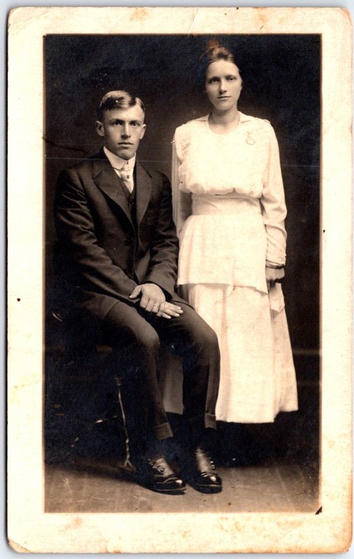 Man and Woman in Formal Sunday Attire Pose for Portrait - Vintage Postcard