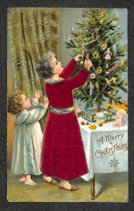 CHRISTMAS HOLIDAY CHILDREN DECORATING TREE EMBOSSED SILK NOVELTY POSTCARD 1909