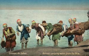 Egypt Natives carrying water from the Nile 01.53