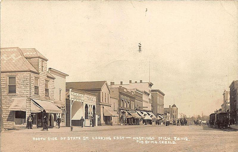 Hastings MI Street View Theatorium Temple Horse Wagon Store Fronts RPPC Postcard