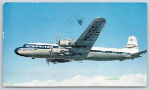 Aviation~United Air Lines~DC-7 Airplane Underwing~Flight Scene~1955 Postcard