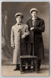 RPPC Two Young Men Hats And Coats Studio Photo Postcard R30