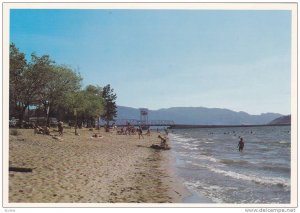 One of the superb beaches on the shores of sunny Okanagan Lake, Kelowna, B.C....