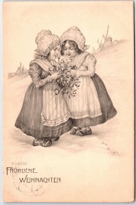 VINTAGE POSTCARD PAIR OF TRADITIONAL GERMAN GIRLS MERRY CHRISTMAS 1907
