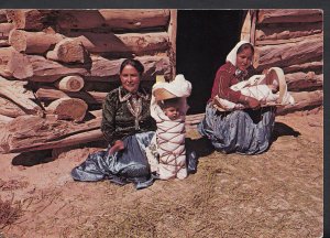 America Postcard - Navajo Women Sit In Front of Their Log & Mud Hogan B2649