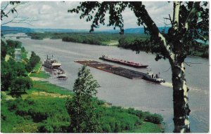 Barges and Steamboat on the Might Mississippi River Louisiana