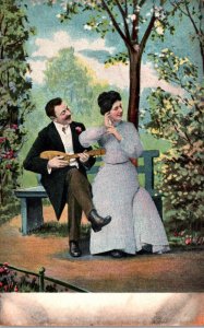 Romantic Couple Man Playing Guitar