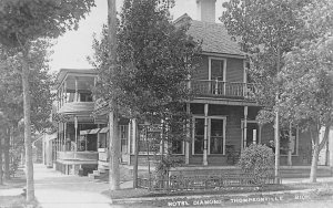 Thompsonville Michigan~Hotel Diamond Wrap-Around Porch~Nice Posts RPPC c1920