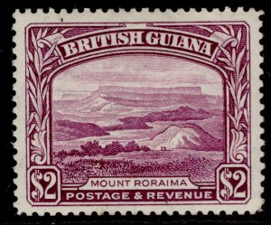 BRITISH GUIANA GVI SG318, $2 purple, NH MINT. Cat £22.