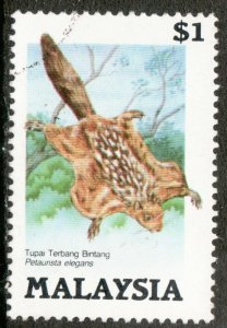 Malaysia Sc #298 - $1 Flying squirrel - Used postage stamp. Cv $6